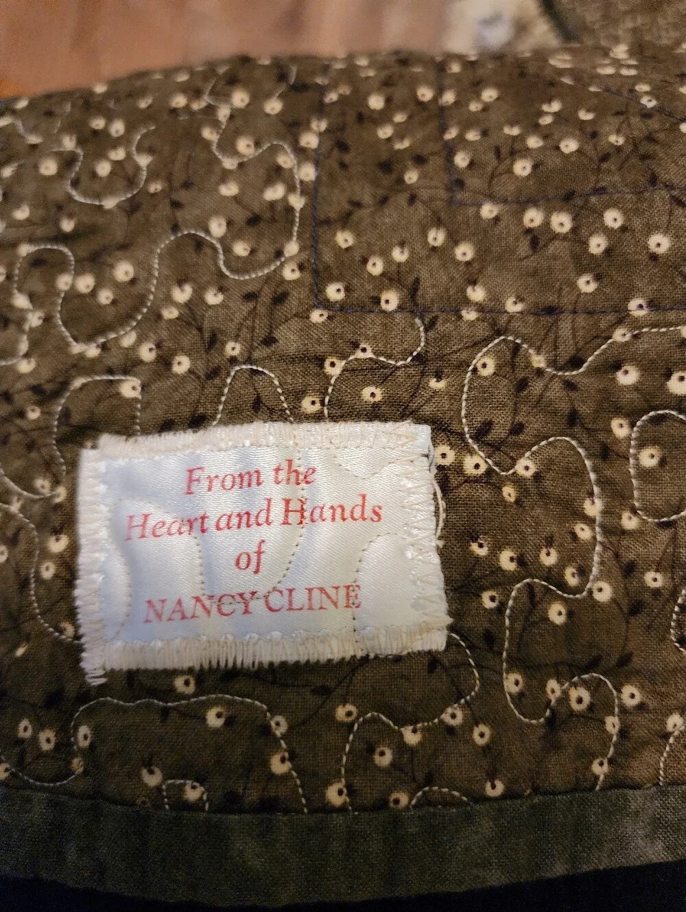 Green, brown and beige quilted table topper